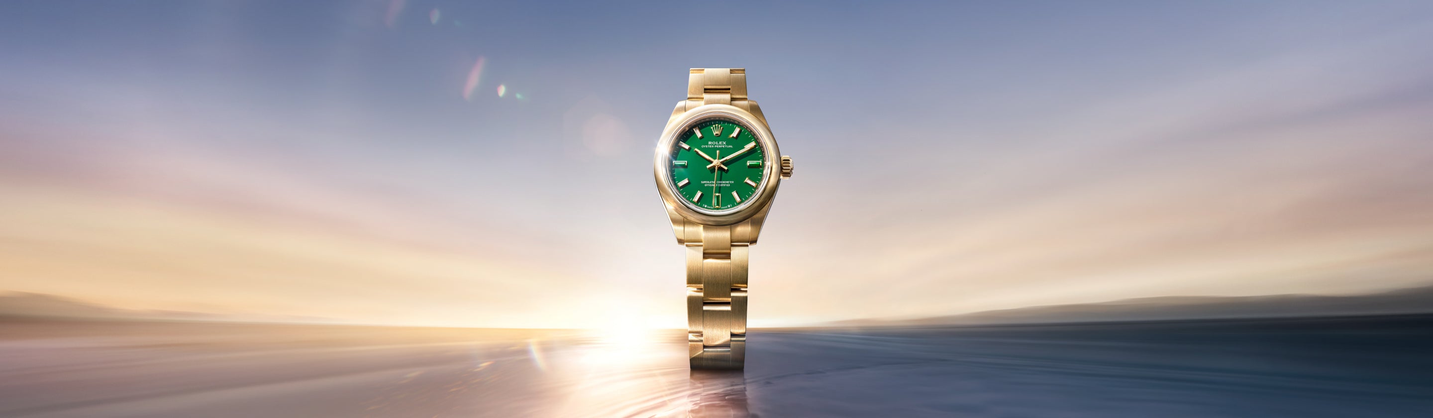 Rolex Oyster Perpetual 28 in 18 kt yellow gold and Oyster Perpetual 34 in 18 kt Everose gold