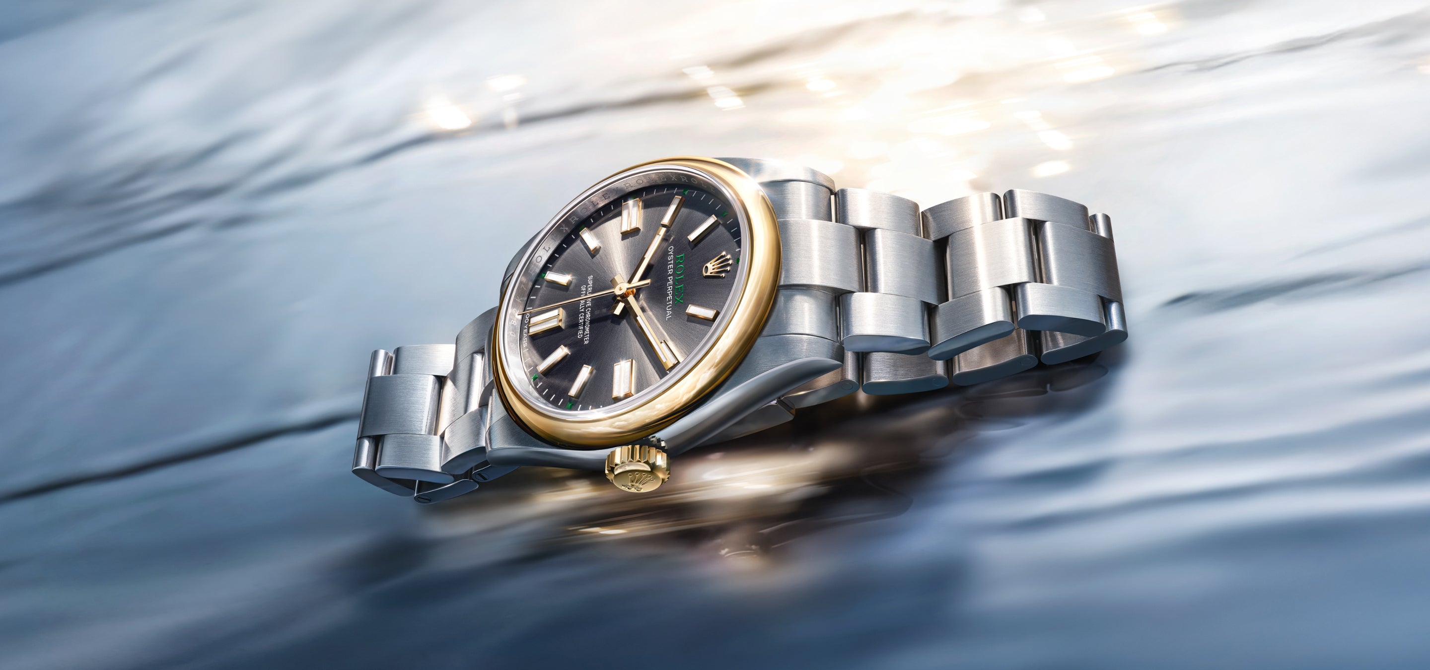 Rolex Oyster Perpetual 41 Oyster case in Oystersteel with yellow gold domed bezel and Twinlock winding crown