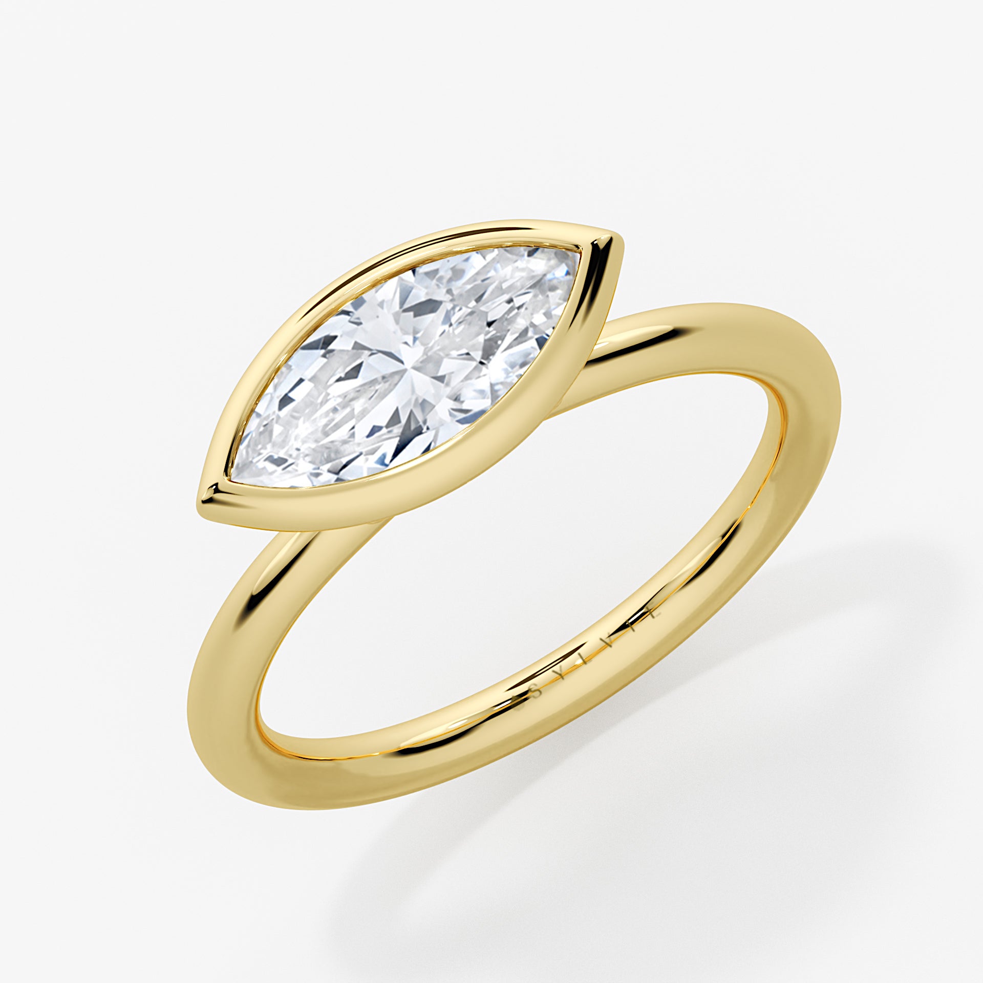 East to West Marquise Cut Bezel Engagement Ring - Cliodhna
